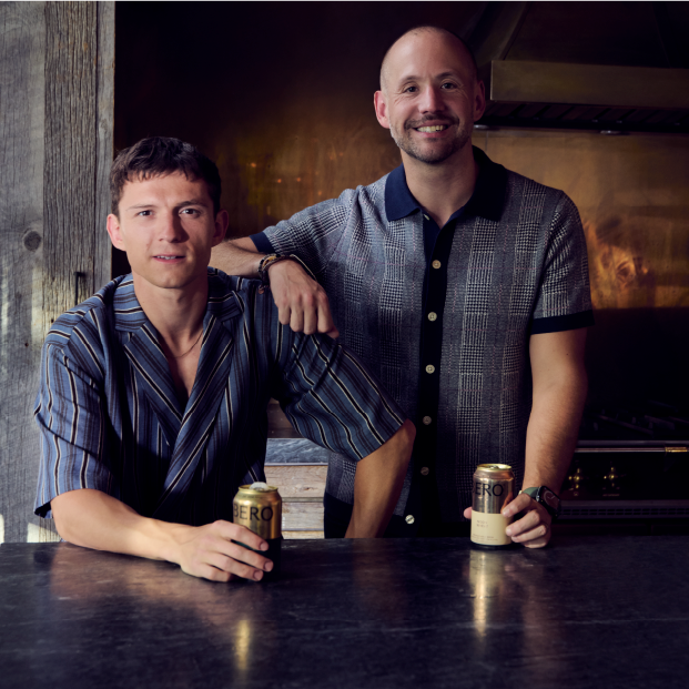 BERO cofounders Tom Holland and John Herman, each holding a can of BERO beer.